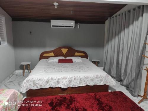 Ένα ή περισσότερα κρεβάτια σε δωμάτιο στο Casa Aldeia Velha