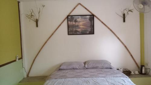 Postel nebo postele na pokoji v ubytování navaa Bungalow