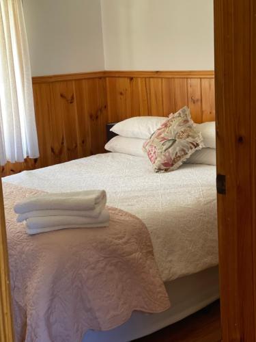 Ένα ή περισσότερα κρεβάτια σε δωμάτιο στο Monaukai Estate