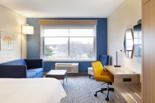 a hotel room with a bed and a desk at Holiday Inn Express Hotel & Suites Vineland Millville, an IHG Hotel in Vineland