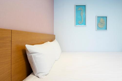 Sims Hotelにあるベッド