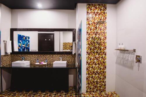 A bathroom at L'amore Hotel Seminyak