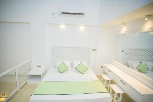 Ein Bett oder Betten in einem Zimmer der Unterkunft Greencliff Mirissa