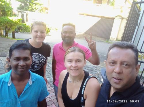a group of people posing for a picture at Vino Villa Tourists & Local Accommodations - 24 Hrs in Kandy