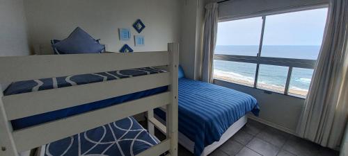 Katil atau katil-katil dalam bilik di 703 High Tide, Holiday Apartment, Main Beach, Amanzimtoti