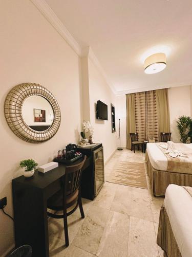 TV a/nebo společenská místnost v ubytování Hussein Hassan Ali Bayari Hotel