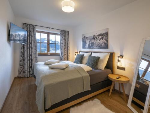 Кровать или кровати в номере Appartement Stallfeldhof