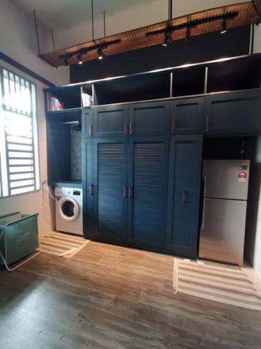 Kuchyň nebo kuchyňský kout v ubytování Cozy Beach Getaway