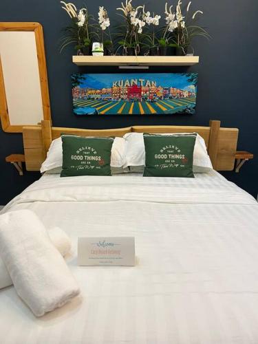 Postel nebo postele na pokoji v ubytování Cozy Beach Getaway