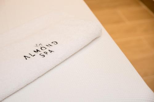 a napkin with the word mayday written on it at Almond Hotel - Adults only in Neve Ilan