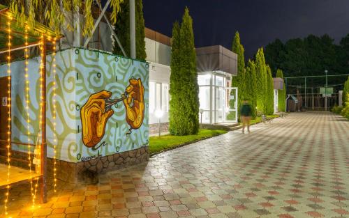 Jardín al aire libre en Арт-отель ololoFamily