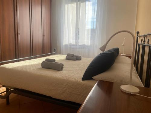 Postel nebo postele na pokoji v ubytování Montegrappa