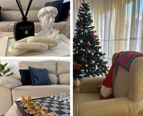 a living room with a christmas tree and a couch at EXPLANADA BEACH FLAT in Alicante