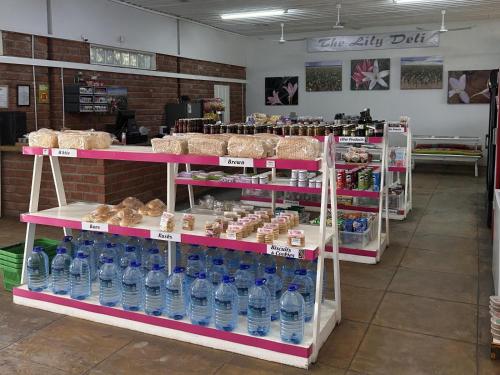 a store filled with lots of bottles of water at Maltahöhe Self Catering in Maltahöhe