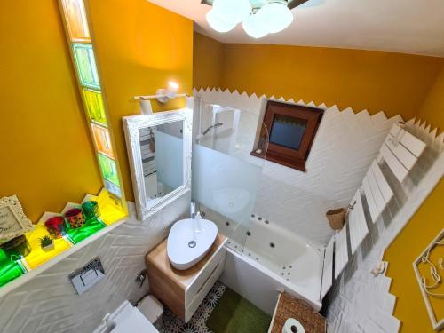 a bathroom in a lego house with a sink at Elisa's Place in Făgăraş