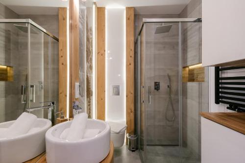 Ένα μπάνιο στο Apartament Góralska Nuta SPA Basen & Sauna