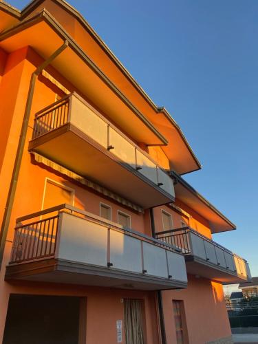 a building with balconies on the side of it at Adria Residence in Gatteo a Mare
