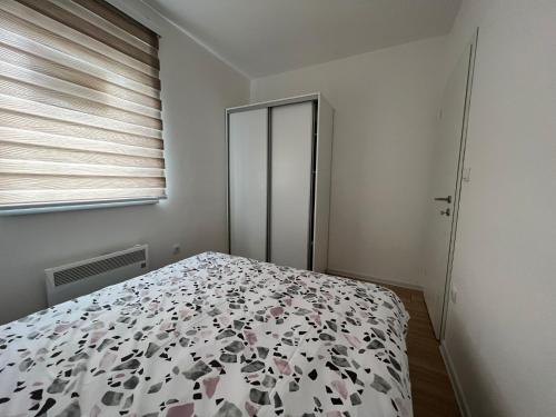 Postel nebo postele na pokoji v ubytování Deluxe NS 2