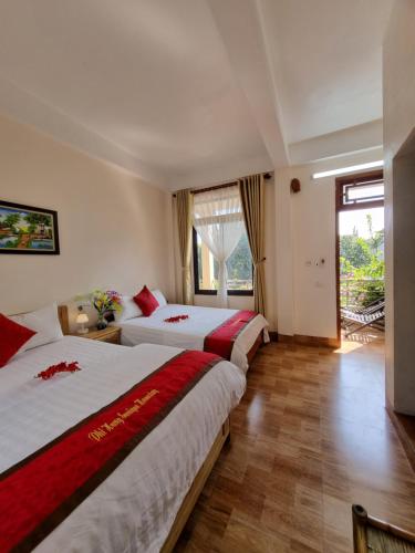 Postel nebo postele na pokoji v ubytování Phi Hung's Unique Homestay