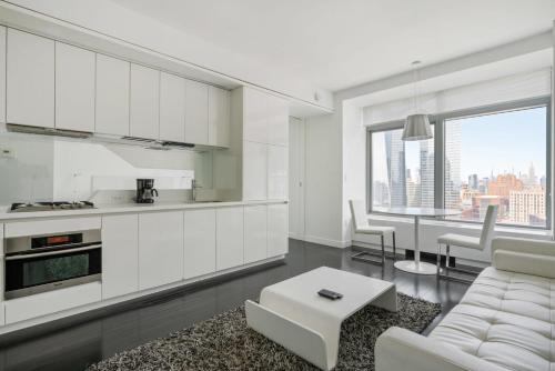A kitchen or kitchenette at Financial District w WD gym elevator NYC-1366