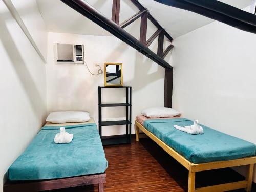 Letto o letti in una camera di Amancio's Balai - Near the Airport, City Center!