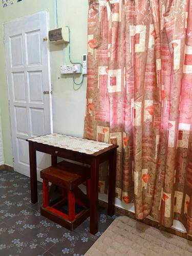 Fotografie z fotogalerie ubytování yellow homestay v destinaci Kampong Sarang Tiong