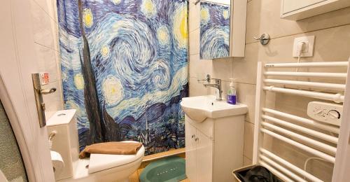 a bathroom with a toilet and a sink at Apollo 3 - Luxury Apartment (City Center Studio) in Katerini