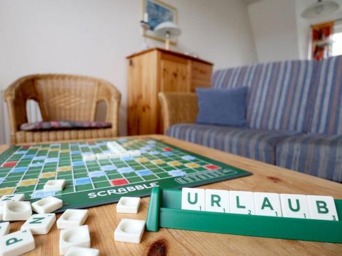 a monopoly game on a table in a living room at Altes Zollhaus, Fewo- Nr 4 in Barendorf