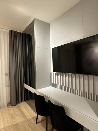 TV a/nebo společenská místnost v ubytování BW Lux Apartments