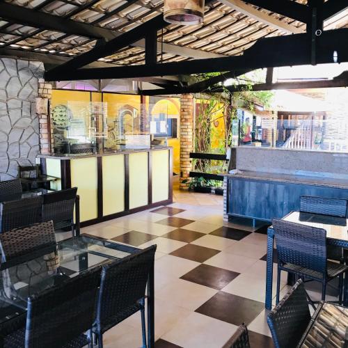 Un lugar para sentarse en Hotel Pousada Latitude