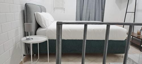 Postel nebo postele na pokoji v ubytování Stop al Duomo