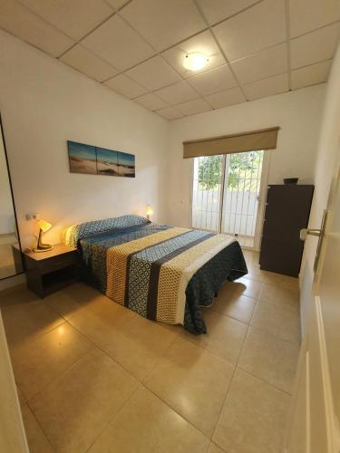 Postel nebo postele na pokoji v ubytování Casita El Destino