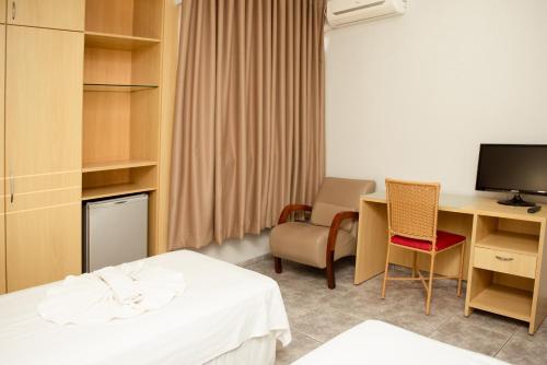 Postel nebo postele na pokoji v ubytování River Palace Hotel