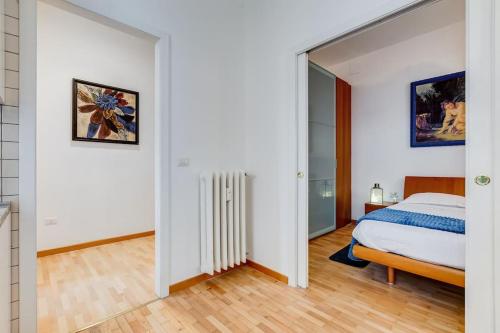 Ένα ή περισσότερα κρεβάτια σε δωμάτιο στο Clemente XII Al Quirinale House