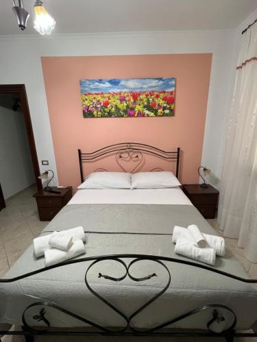Postel nebo postele na pokoji v ubytování a casa di Ale