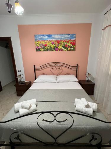 Posteľ alebo postele v izbe v ubytovaní a casa di Ale