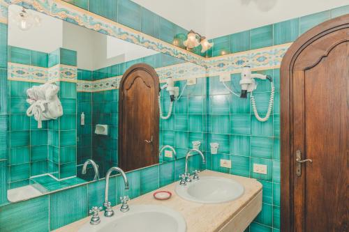 Koupelna v ubytování Hotel Poseidon