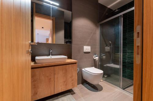 Ένα μπάνιο στο Wellness Apartments Nomad