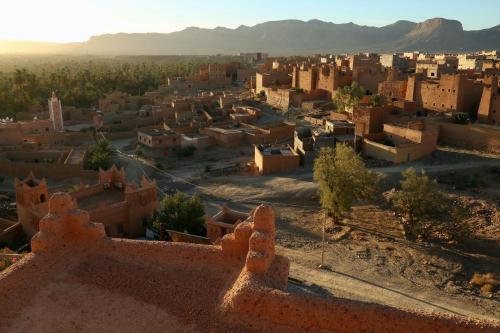 an aerial view of a village in the desert at La perle de saghro in Nkob