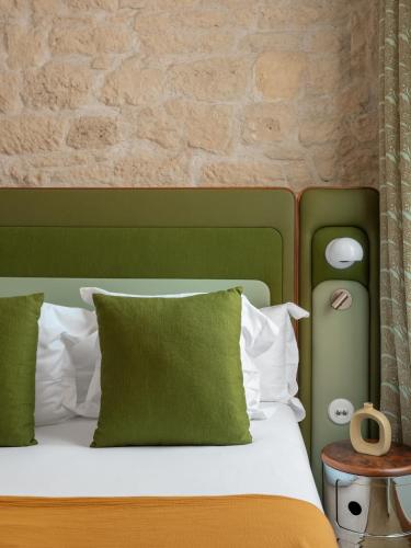 Letto o letti in una camera di Hôtel Saint-André des Arts