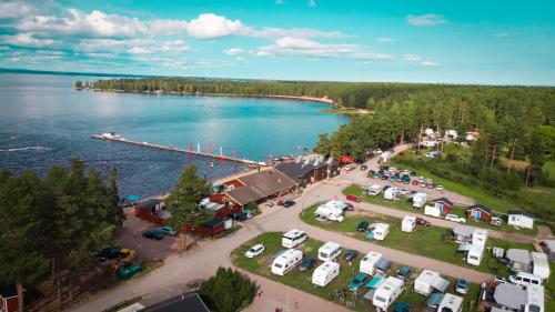 an aerial view of a parking lot next to a lake at Årsunda Strandbad in Årsunda