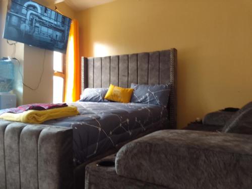 Ένα ή περισσότερα κρεβάτια σε δωμάτιο στο Classic Suite Apartment