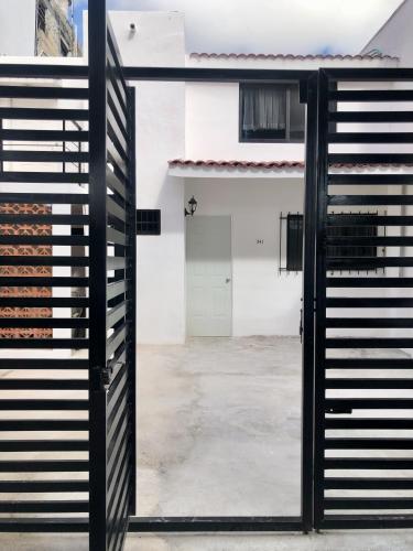 a view through a glass door of a building at El Depa del Puerto in Cancún