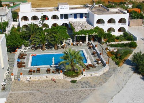 an aerial view of a resort with a swimming pool at Christiana Hotel in Ambelas