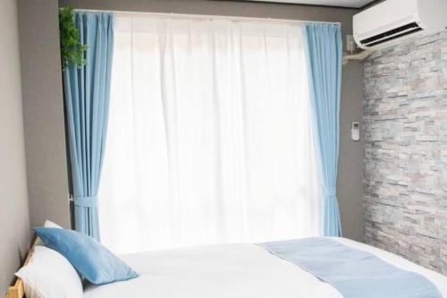 Guest House HAMAYA 大国町駅から1分,難波駅まで1駅2分の好立地