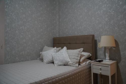 Кровать или кровати в номере Belfort Roxo,266