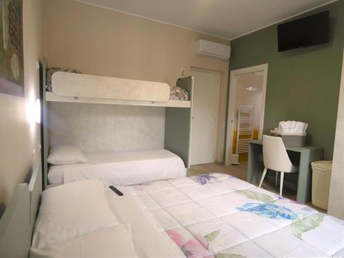 Postel nebo postele na pokoji v ubytování SCAPPO IN UMBRIA, Apartments