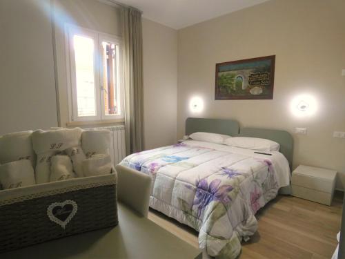 Postel nebo postele na pokoji v ubytování SCAPPO IN UMBRIA, Apartments