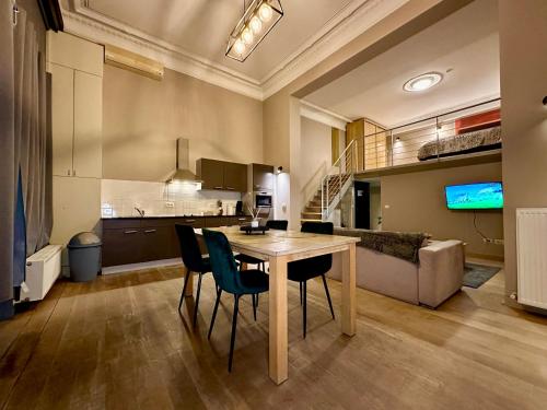 Η κουζίνα ή μικρή κουζίνα στο Luxury Suites Castel by Rikas Hotels