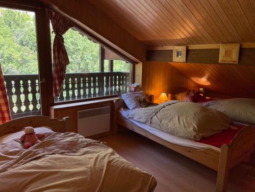 Postel nebo postele na pokoji v ubytování Magnifique chalet Mistouflon